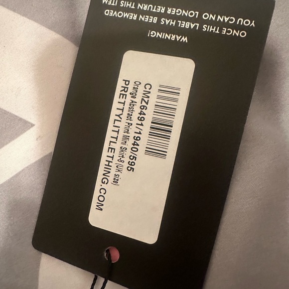 Orange Abstract Print Mini Skin set
PRETTYLITTLETHING - Picture 6 of 6